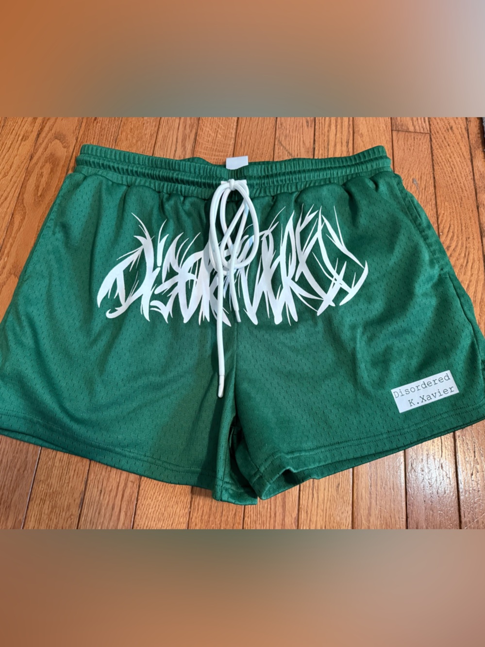 Disordered Green Athletic Mesh Shorts with White Graphic